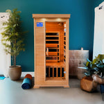 Sunray Sedona 1 Person Infrared Sauna front image with with blue background in a lifestyle setting